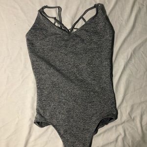 Grainy grey and black colored leotard.